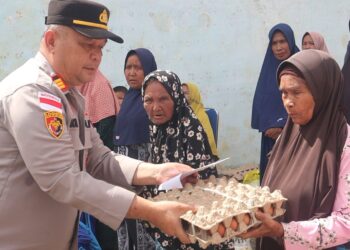 Jumat Berkah, Polres Aceh Tengah Bagikan Paket Sembako untuk 50 KK Warga Gemboyah